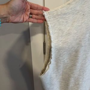 Cream sleeveless sweatshirt